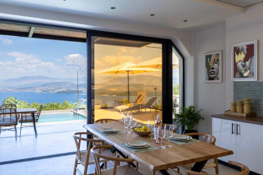Dining by the open bifold doors